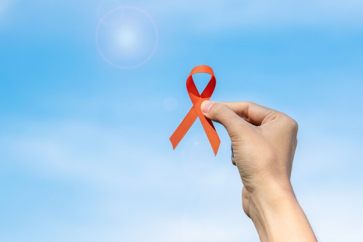 Leukemia, Kidney cancer day, world Multiple Sclerosis, CRPS, Self Injury Awareness month, Orange Ribbon for supporting people living and illness. Healthcare and World cancer day concept